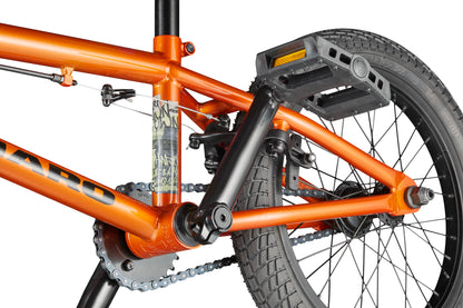Close-up of the Downtown 16 BMX bike—ideal for beginners—featuring chain, pedals, back wheel, and detailed frame.