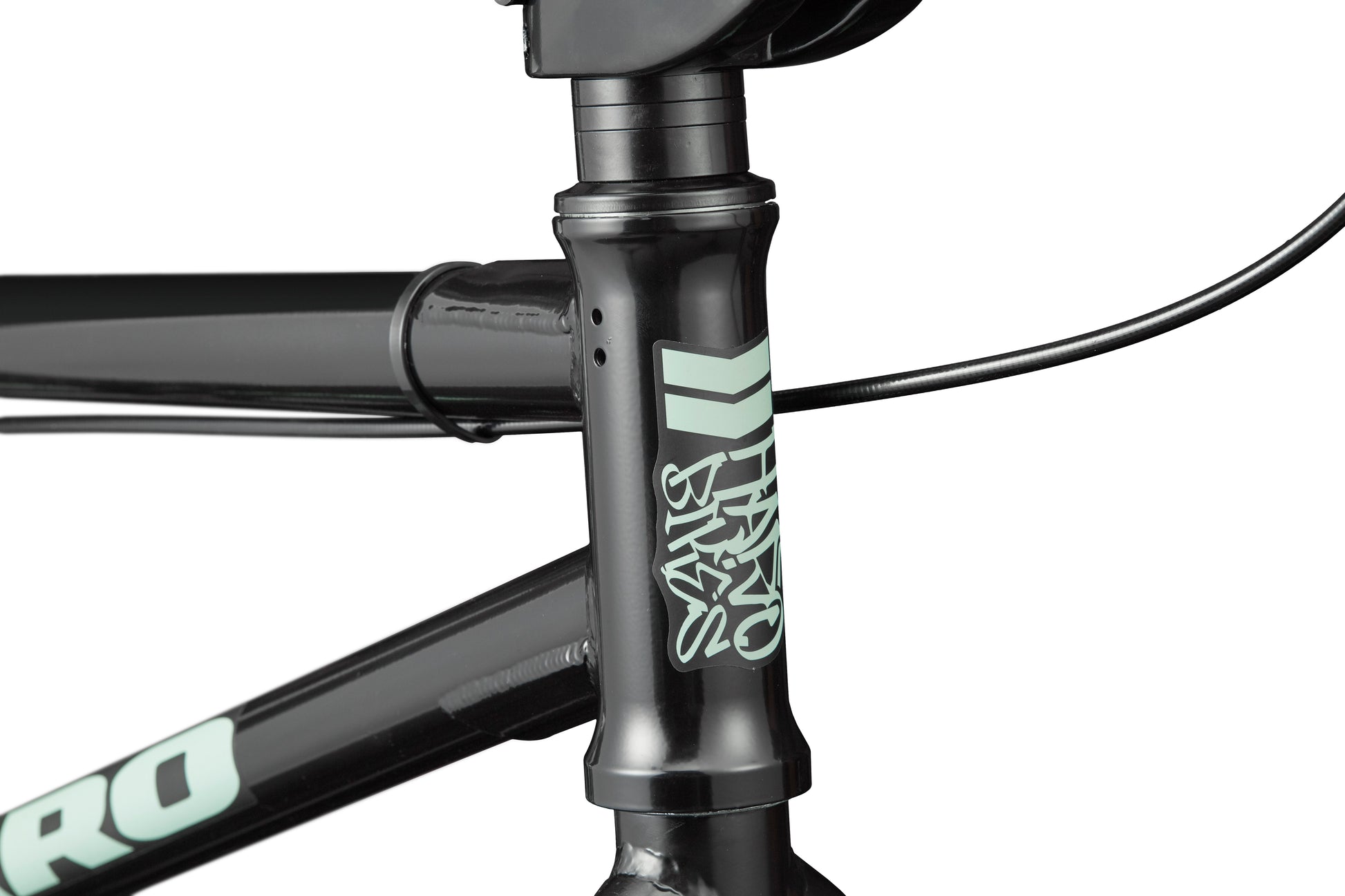 Close-up of the black Downtown 18 BMX frame with a white logo, ideal for small riders, showing handlebars and cables.