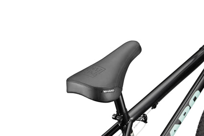 Close-up of a black Downtown 18 bicycle seat and frame, ideal for small riders, against a white background.