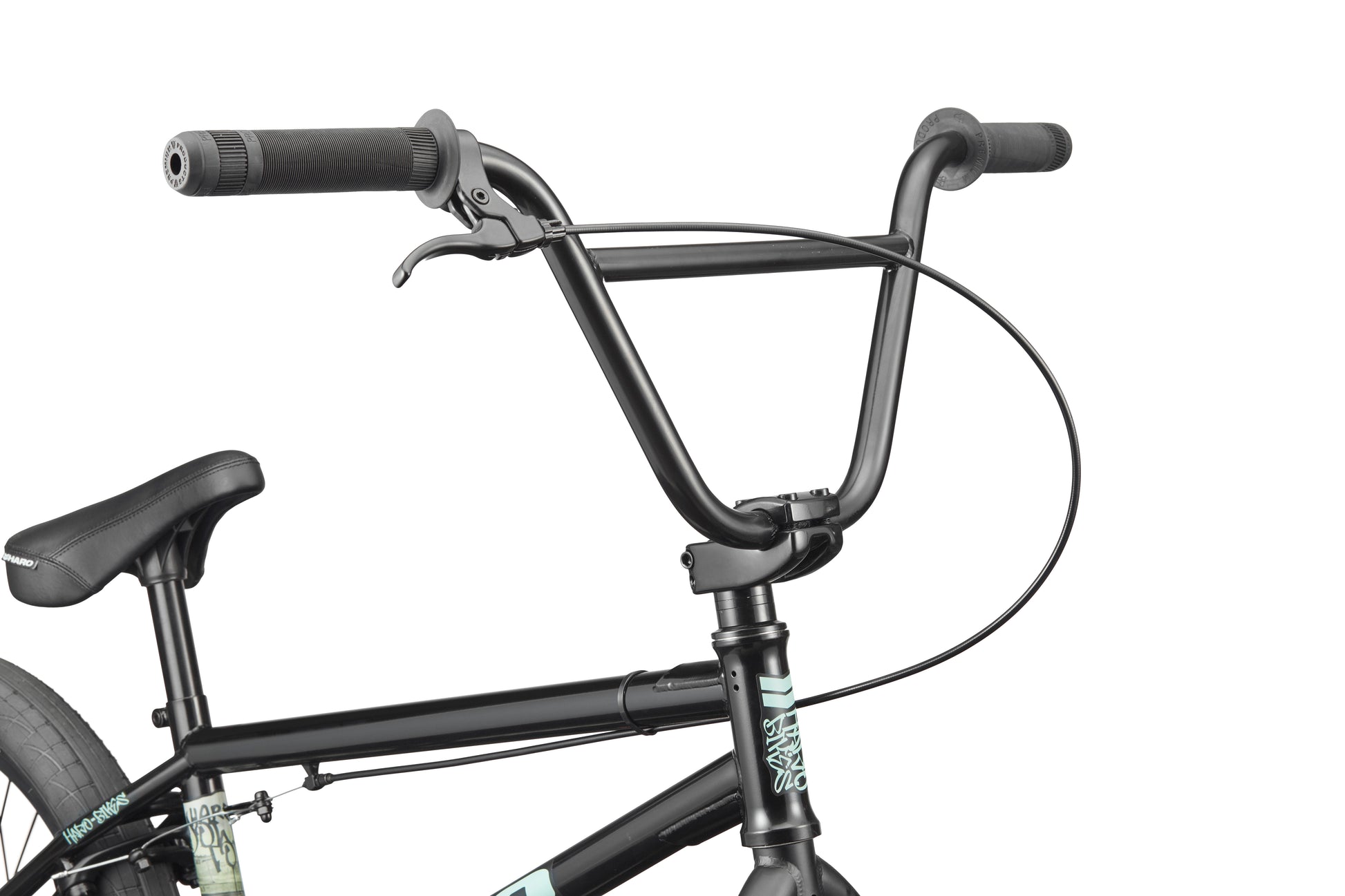 Close-up of Downtown 20 BMX bike’s black handlebars, brake lever, and partial seat against a white background.