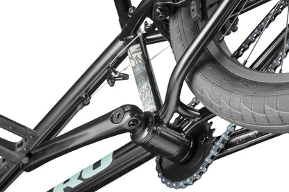 Close-up of the Downtown 20's rear wheel, chain, crank, and frame against a white background—ideal for entry-level riders.