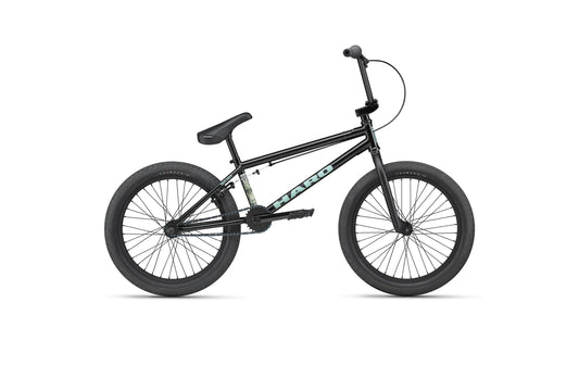 The Haro Downtown 20 BMX bike with thick tires and a straight handlebar is shown against a white background.