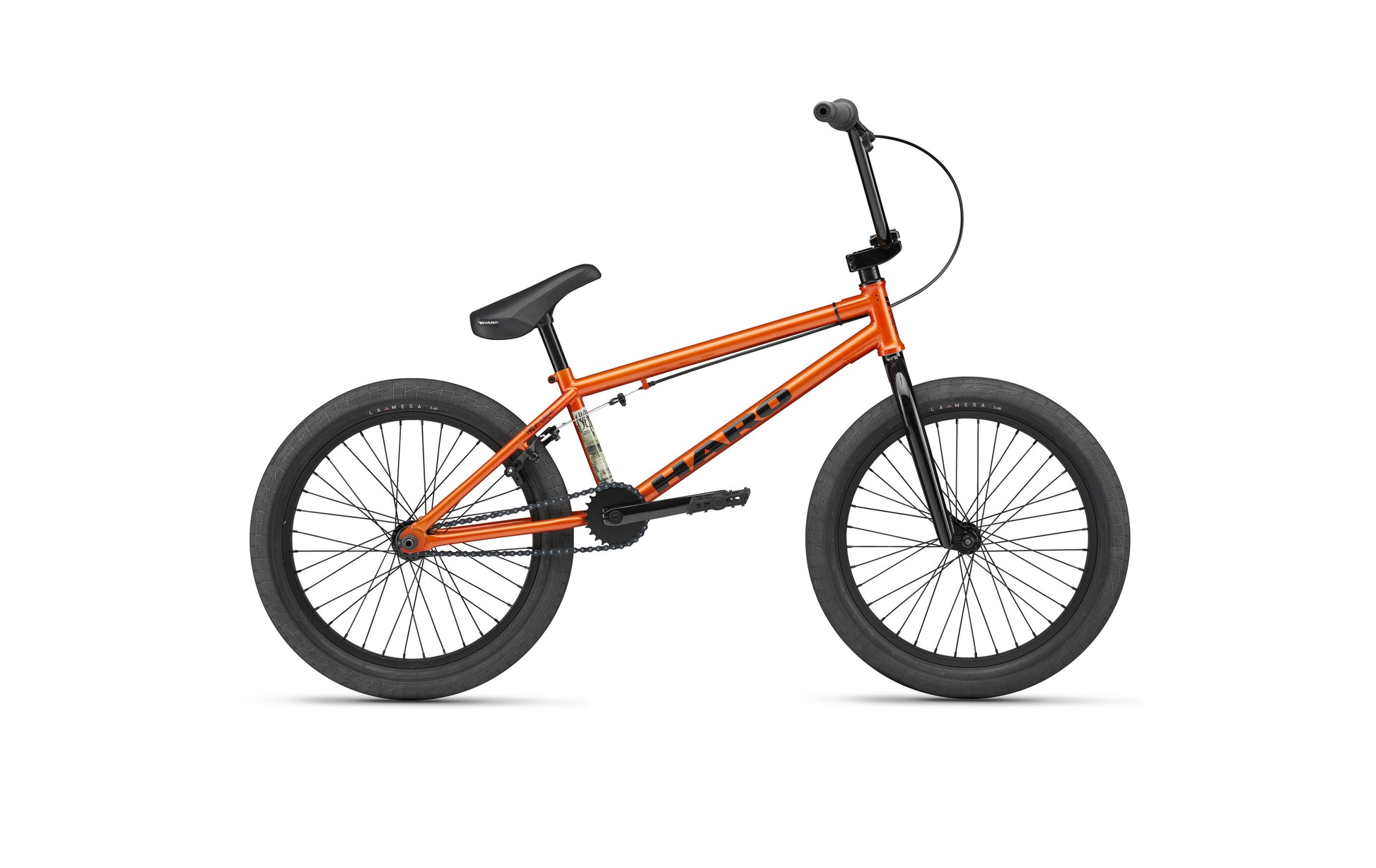The Haro Downtown 20 entry-level BMX, in bright orange with black tires, seat, and handlebars, shown side view on white background.