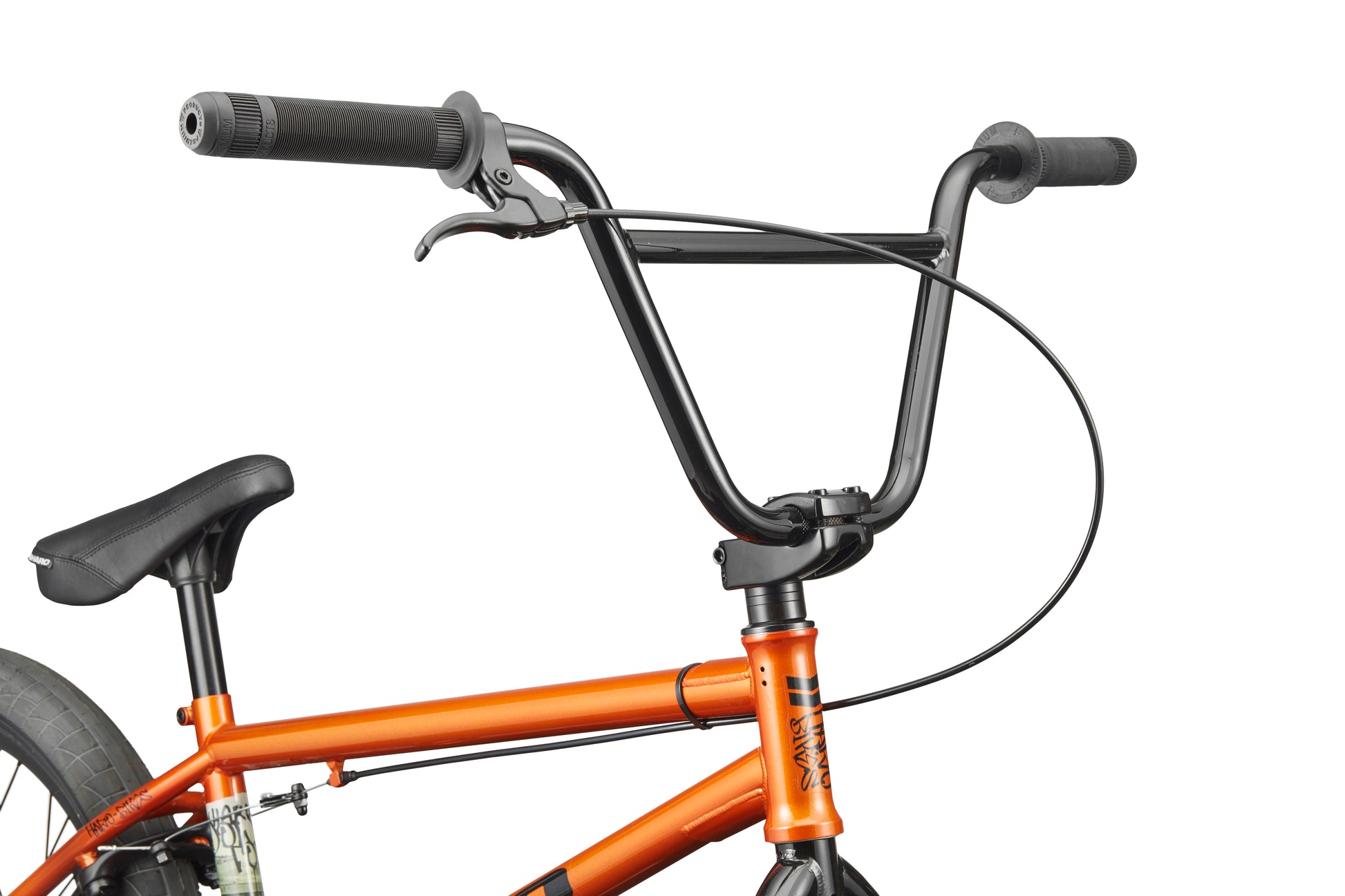 Close-up of Downtown 20 BMX: black handlebars, brake lever, orange frame, and black seat against a white background.