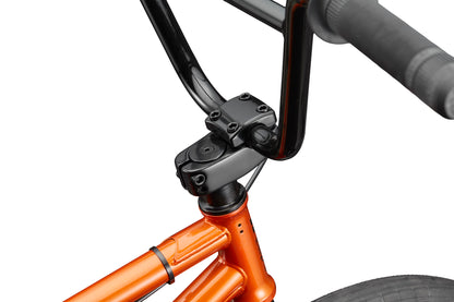 Close-up of the Downtown 20 BMX bike's orange handlebars and stem against a white background.