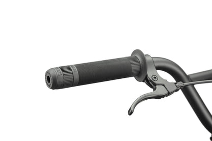 Close-up of a black Downtown 24 BMX handlebar with textured rubber grip and brake lever, highlighting modern versatility.