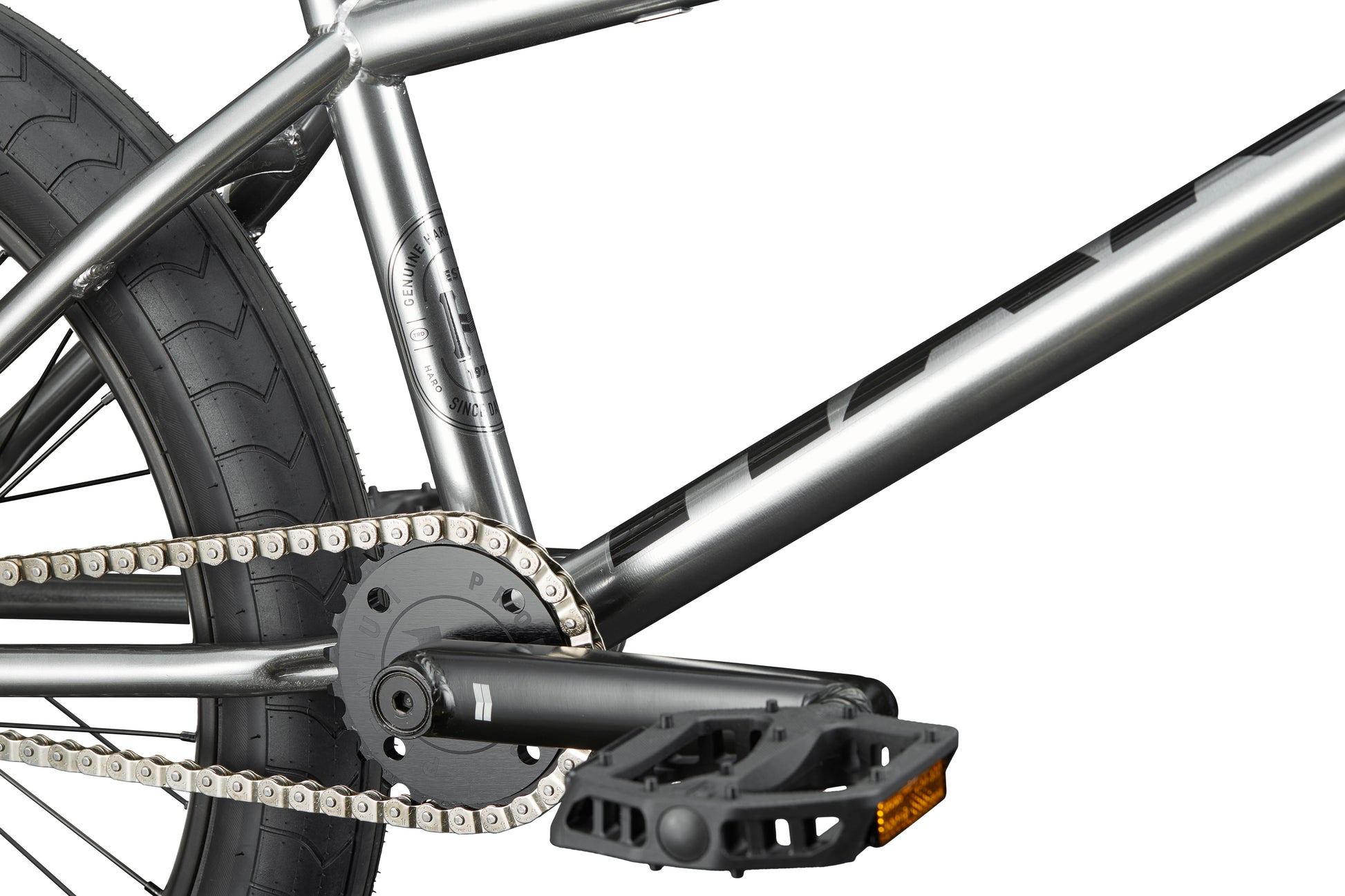 Close-up of a Hoover street BMX’s rear wheel, chain, crankset, and pedal with hub guards against a white background.