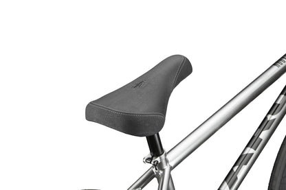 Close-up of a black Hoover BMX bike seat on a silver frame against a white background.