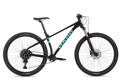 The Double Peak 2: a sleek black mountain bike with teal accents, aluminum frame, SR Suntour fork, knobby tires, and streamlined design.