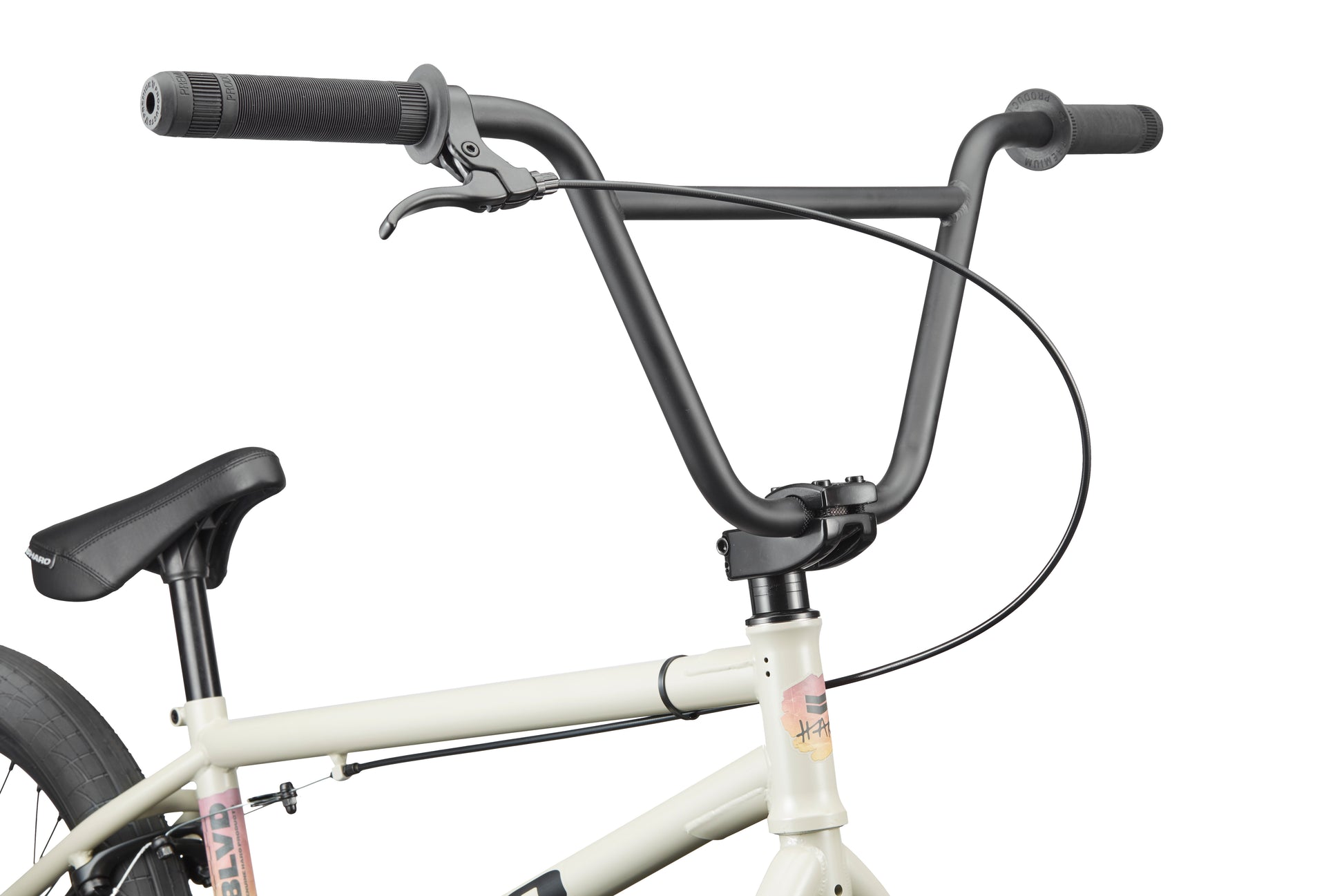 Close-up of BLVD bike’s black handlebars, brake cable, seat, and white frame highlight its balanced geometry against a white background.