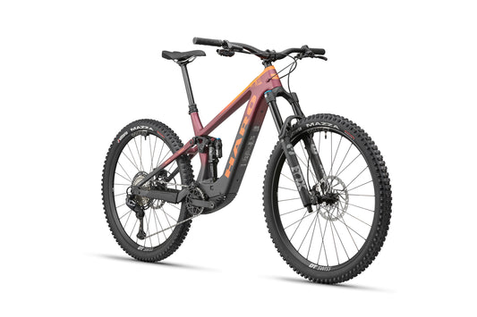 The eDaley Carbon 1 is a lightweight e-bike with thick tires, maroon/black frame, disc brakes, and Shimano XT Di2 shown front-side.