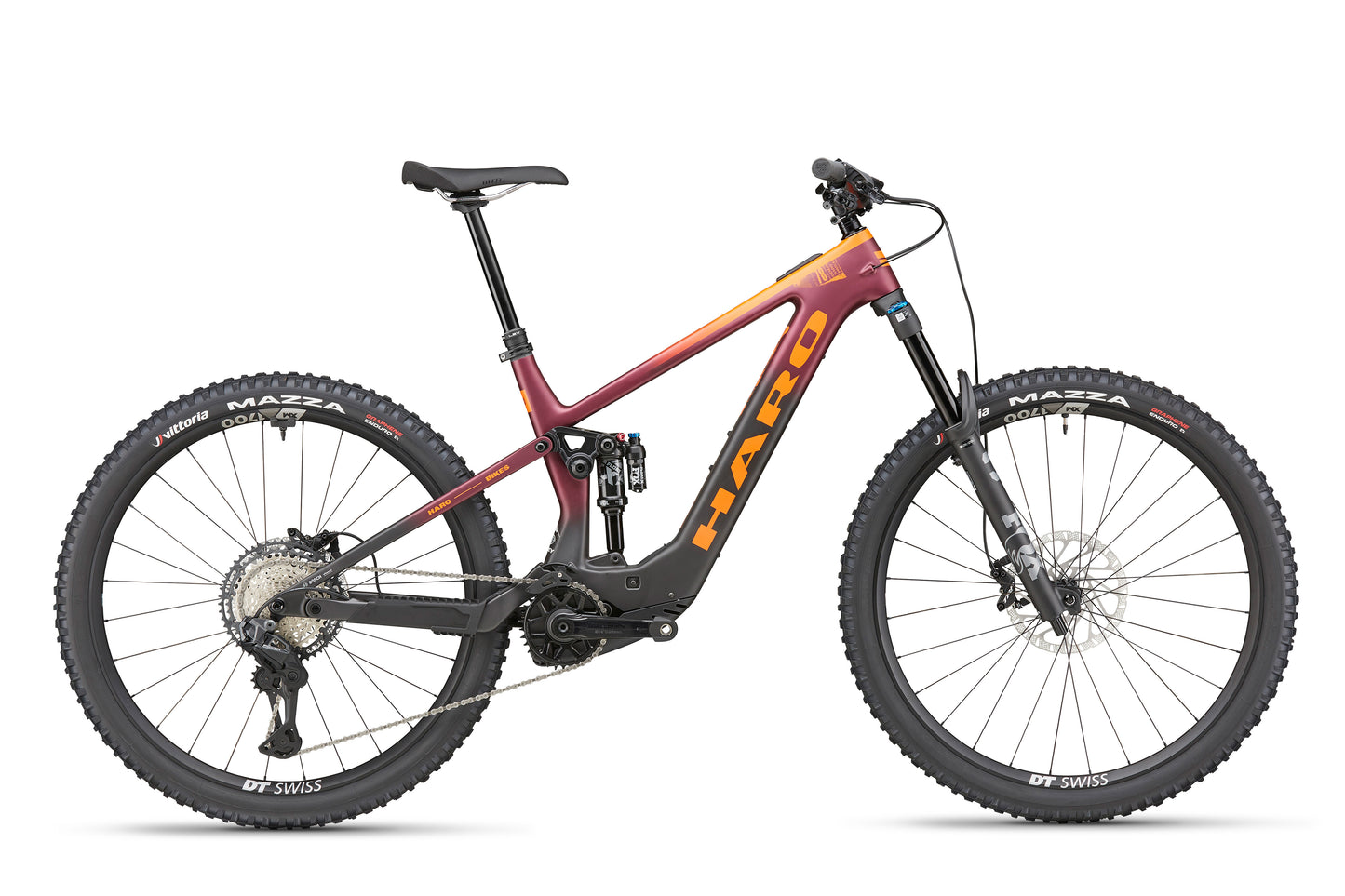 A red and orange eDaley Carbon 1 mountain bike with thick tires and Shimano XT Di2 electronic shifting.