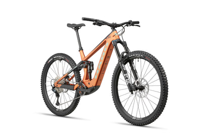 The eDaley Carbon 2 is an orange lightweight full-suspension ebike with thick tires, Shimano SLX, disc brakes, and a FOX fork.