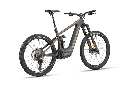 The eGreer Carbon Top Shelf: full-suspension ebike with thick tires, carbon frame, branding, and Bosch Performance Line CX.