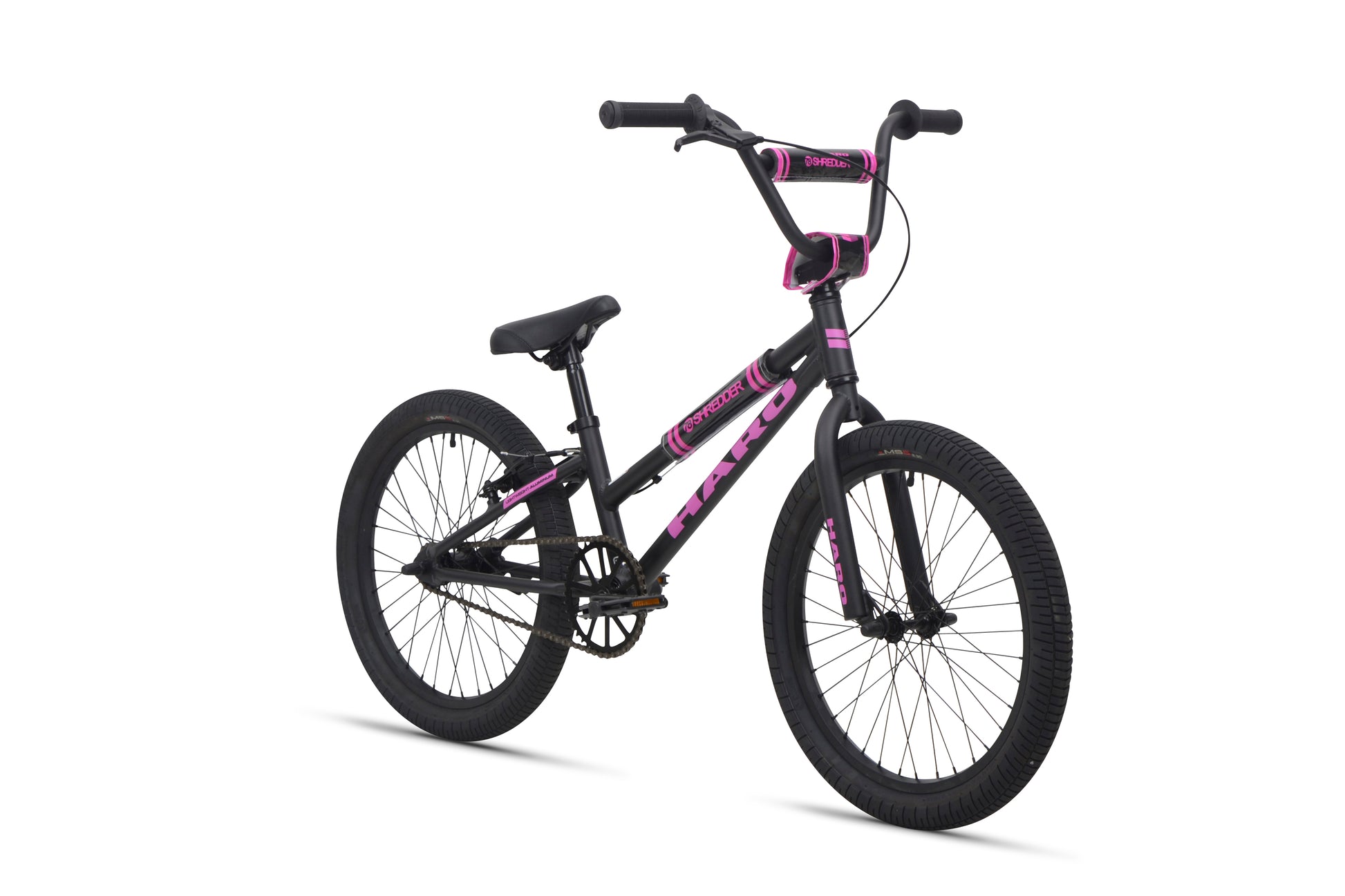Shredder 20 ST has a low top tube, thick tires, angled seat, and upright handlebars on a white background.