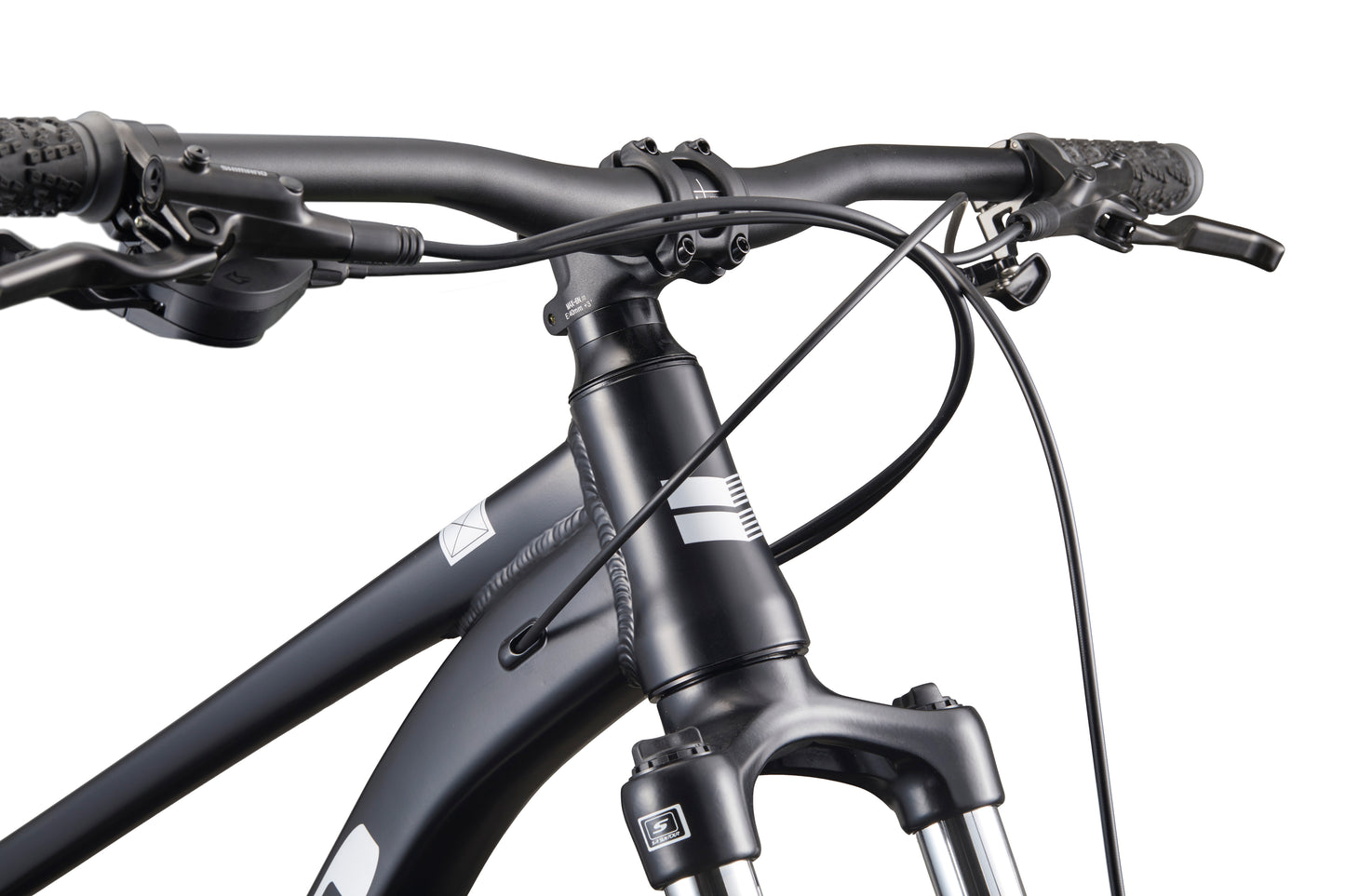 Close-up of Double Peak’s black handlebars, front suspension fork, and hydraulic disc brakes against a white background.