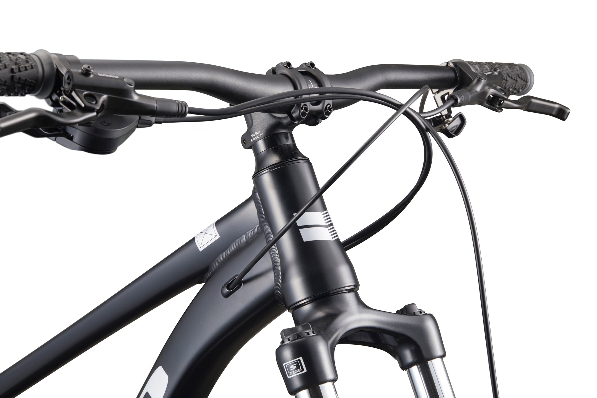 Close-up of Double Peak’s black handlebars, front suspension fork, and hydraulic disc brakes against a white background.
