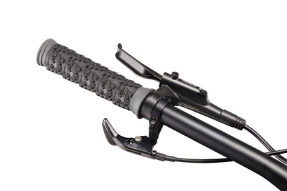 Close-up of Double Peak bike handlebar with textured grip, hydraulic disc brakes, lever, and shifter on white background.