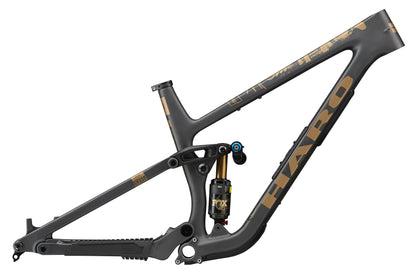 Greer Carbon Frameset: Matte black and gold, high-performance mountain bike frame with HARO logo and FOX rear shock.