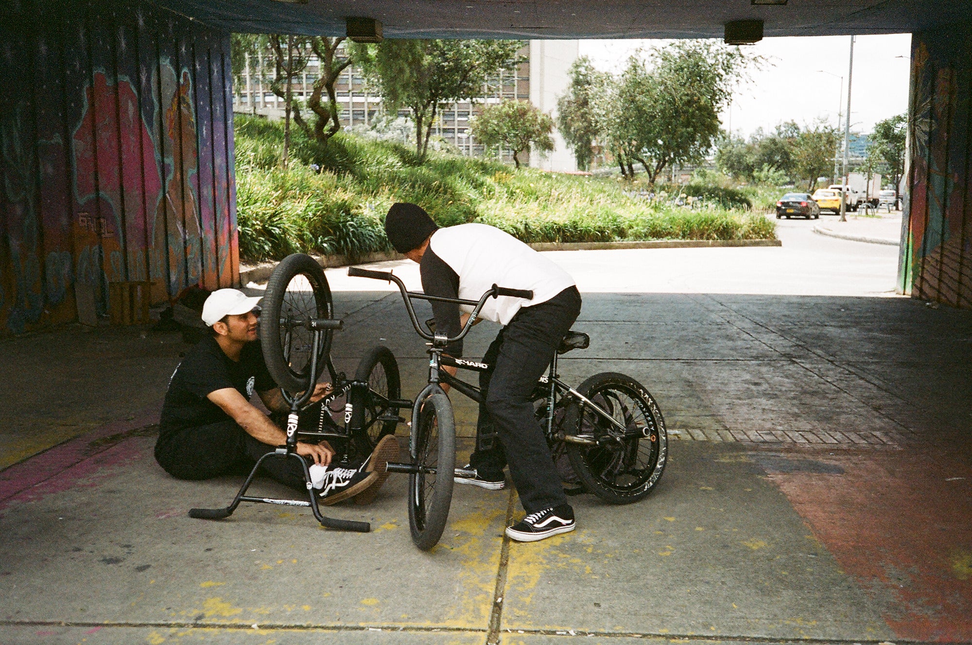 Team riders working on their bikes
