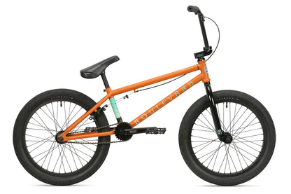 The Haro Bikes Boulevard 20.5 BMX bike features an orange frame with BOULEVARD inscribed in white, a black seat, handlebars, pedals, and thick black tires. Its minimalist design is ideal for stunts and tricks, offering thrill-seekers a durable ride.