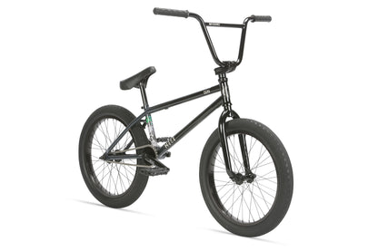 The Haro Bikes Dana BMX bike features a sturdy chromoly frame with premium CK tires, a high-rise handlebar, and a cushioned seat, all in black set against a white background.