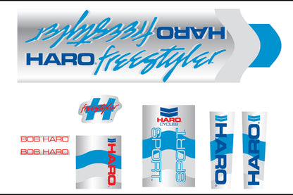 Authentic 1985 Decals Sport Chrome by Haro Bikes featuring Haro and Freestyler in blue script on silver, with additional Haro Sport decals, red and blue branding elements, logos, and iconic Bob Haro text. Ideal for vintage bike enthusiasts.