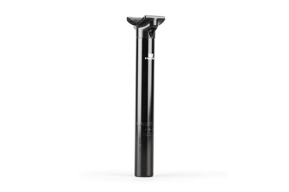 The Haro Bikes Baseline Stealth Seatpost is a black, CNC machined extruded aluminum seat post with a shiny finish and subtle markings. It is sleek and cylindrical with a clamp at the top for seat attachment, set against a plain white background.