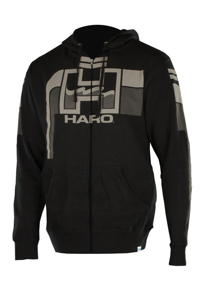 The Haro Retro Hoody by Haro Bikes is a black zip-up hoodie adorned with a gray geometric design and the word HARO on the front, featuring a drawstring hood and front pockets.