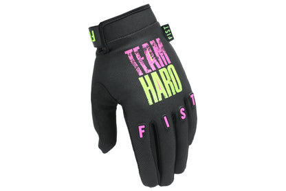 The Haro Bikes Haro Team Glove is black with TEAM HARD in bold pink and yellow on the back. Fingers spell FIST in vibrant green and pink, featuring small neon green tabs with FIST text. Its ergonomically shaped for style and comfort.