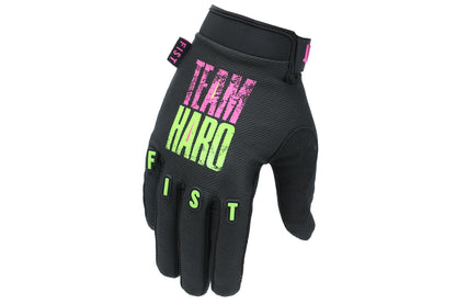 The lightweight Haro Team Glove features TEAM HARO in vibrant pink and green on the back, with the brand name Haro Bikes prominently displayed on the fingers in striking green.