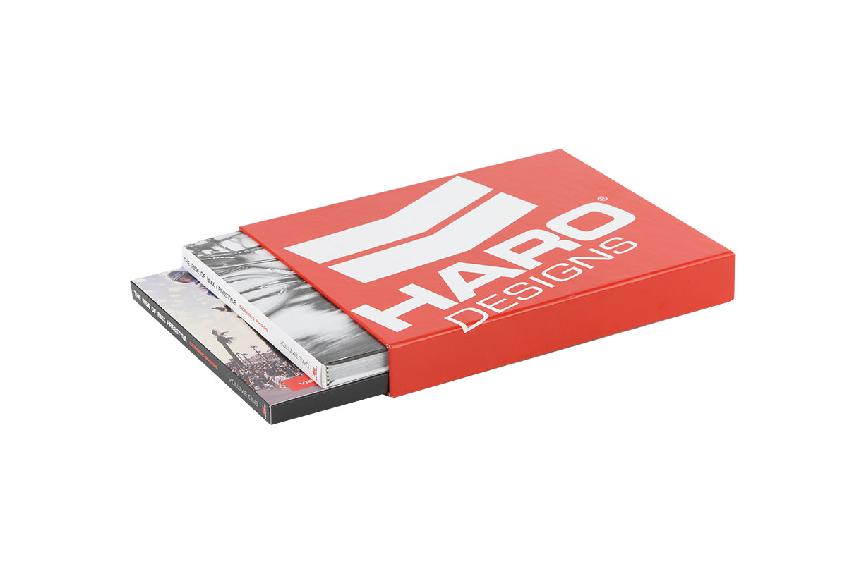 A partially open box reveals The Rise of BMX Freestyle - Volume 1 + 2 Box Set, a tribute to classic BMX culture.