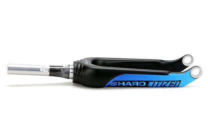 A black and blue Cliq Citizen Carbon Fork lies horizontally on a white background.